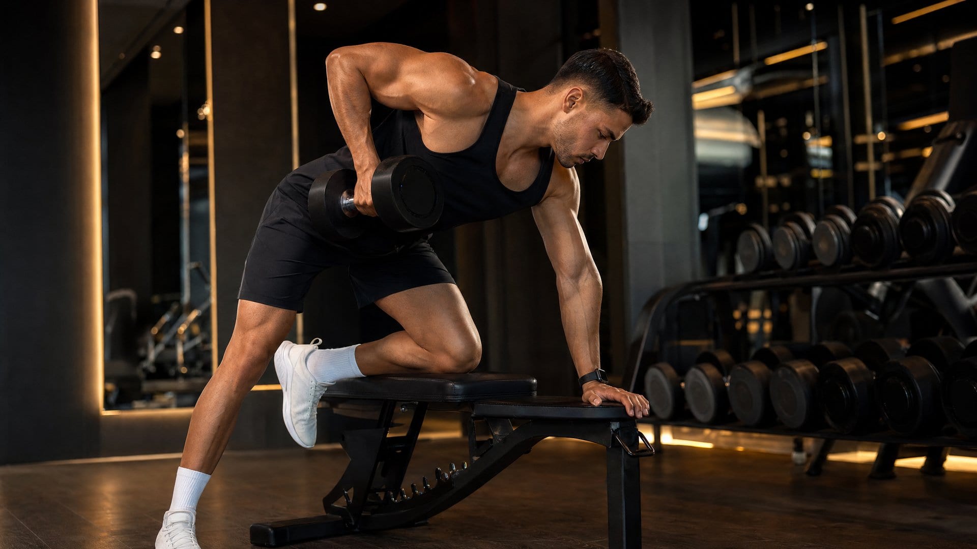 Person performing a dumbbell exercise with proper form